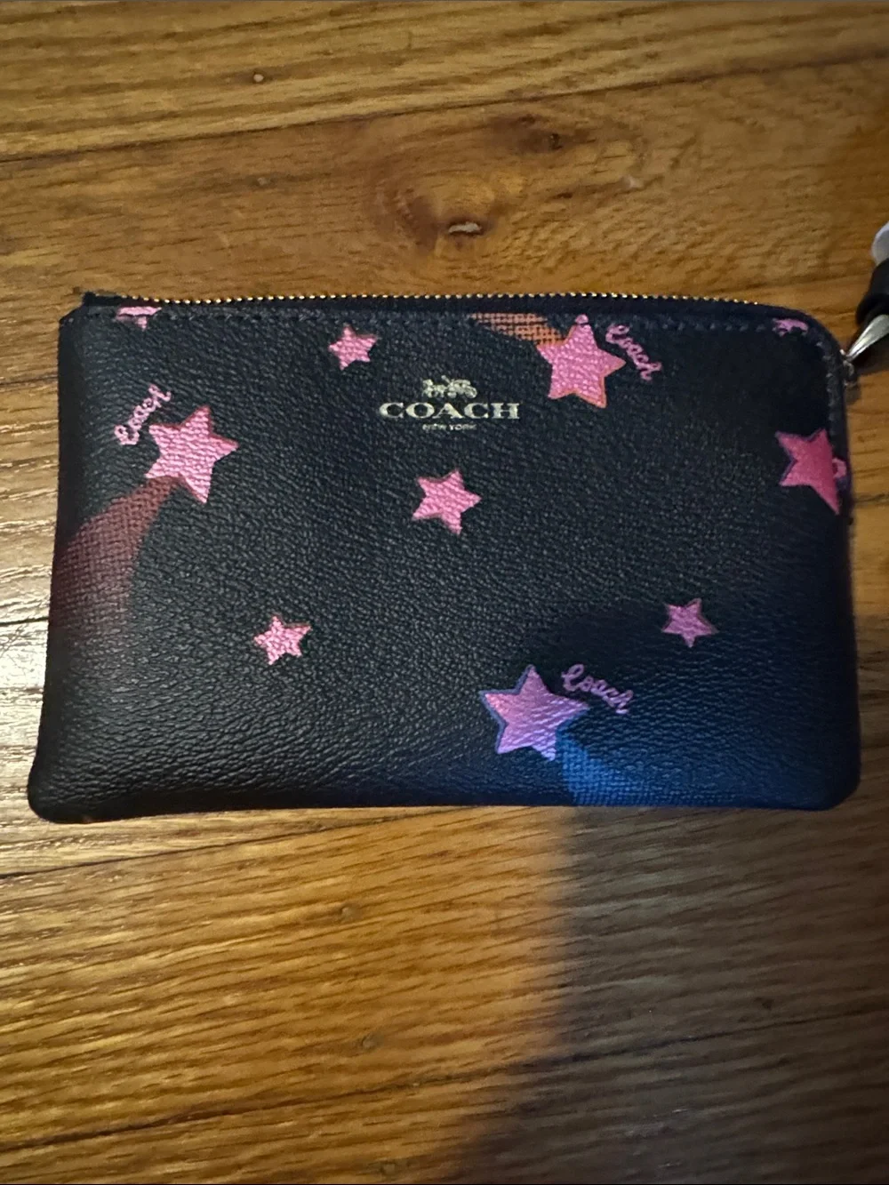 COACH Black Leather wristlet with Pink Star Accents
